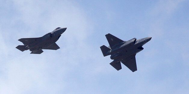 Two F-35 jets arrive at it's new operational base Wednesday, Sept. 2, 2015, at Hill Air Force Base, in northern Utah. Two F-35 jets touched down Wednesday afternoon at the base, about 20 miles north of Salt Lake City. A total of 72 of the fighter jets and their pilots will be permanently based in Utah. (AP Photo/Rick Bowmer)