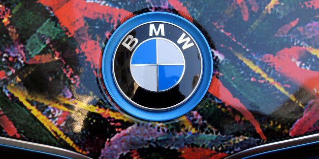 The BMW logo is seen on the bonnet of a colour wrapped vehicle in London, Britain September 30, 2016. REUTERS/Toby Melville
