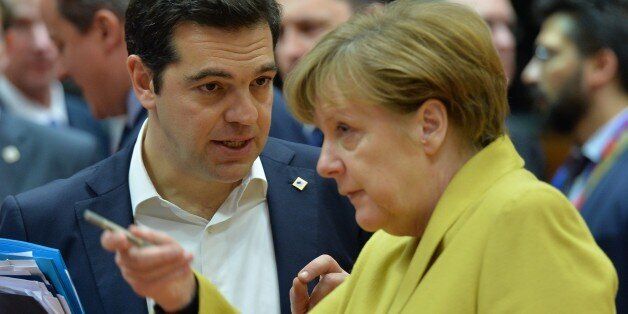 BRUSSELS, BELGIUM - MARCH 18: Greek Prime Minister Alexis Tsipras (L) and German Chancellor Angela Merkel (R) attend the Turkey-EU Heads of State or Government summit as part of the European Union Leaders Summit in Brussels, Belgium on March 18, 2016. (Photo by Dursun Aydemir/Anadolu Agency/Getty Images)