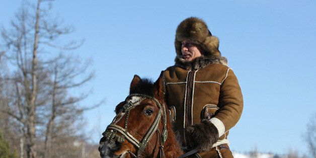 A picture released on March 6, 2010 shows Russian Prime Minister Vladimir Putin taking a horseback ride in the Karatash area, near the town of Abakan, during his working trip to Khakassia, on February 25, 2010. AFP PHOTO - RIA-NOVOSTI / ALEKSEY DRUZHININ (Photo credit should read ALEKSEY DRUZHININ/AFP/Getty Images)
