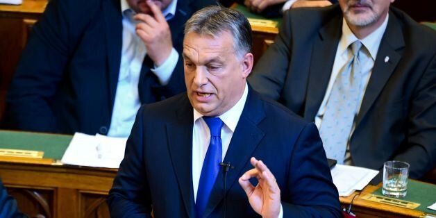 Hungarian Prime Minister Viktor Orban gives a speech at the parliament in Budapest on October 3, 2016.Orban suffered a blow on October 2, 2016 in his revolt against the European Union after low voter turnout voided his referendum aimed at rejecting a contested migrant quota plan. / AFP / ATTILA KISBENEDEK (Photo credit should read ATTILA KISBENEDEK/AFP/Getty Images)