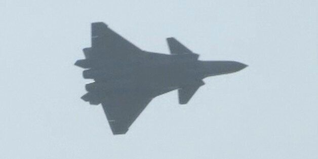 In this image made from video, the J-20 stealth fighter jet flies at the China's International Aviation and Aerospace Exhibition in Zhuhai on Tuesday, Nov. 1, 2016. China's J-20 stealth fighter has made its public debut at Airshow China in the southern city of Zhuhai in the latest sign of the growing sophistication of the country's military technology. (AP Photo)