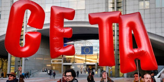 Demonstrators protest against CETA outside the EU summit in Brussels, Belgium, October 20, 2016. REUTERS/Francois Lenoir