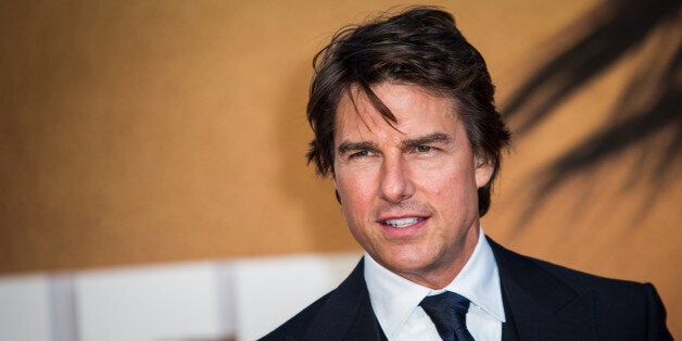 Actor Tom Cruise poses for photographers upon arrival at the premiere of the film 'Jack Reacher: Never Go Back' in London, Thursday, Oct. 20, 2016. (Photo by Vianney Le Caer/Invision/AP)