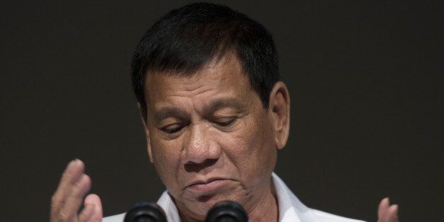 Rodrigo Duterte, the Philippines' president, speaks during the Philippine Economic Forum hosted by the Japan External Trade Organization (JETRO) in Tokyo, Japan, on Wednesday, Oct. 26, 2016. Duterte said he wanted all foreign troops out of the Philippines in two years as he continued his tirades against the U.S. during his three-day visit in Japan, a key American ally. Photographer: Tomohiro Ohsumi/Bloomberg via Getty Images