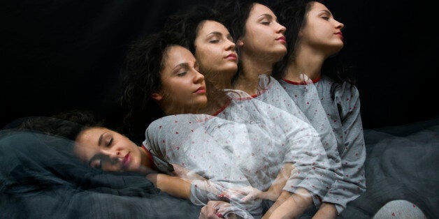 Multiple exposure of sleeping girl getting up