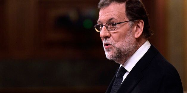 Spanish interim Prime Minister Mariano Rajoy speaks during the parliamentary investiture vote for a prime minister, at the Spanish Congress (Las Cortes) on October 29, 2016, in Madrid Spain turns the page on a 10-month political crisis today as lawmakers ready to vote the conservatives back in power, although at the head of a government with unprecedented opposition. / AFP / JAVIER SORIANO (Photo credit should read JAVIER SORIANO/AFP/Getty Images)