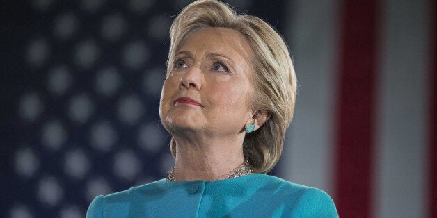 Hillary Clinton, 2016 Democratic presidential nominee, listens on stage during a campaign rally in Manchester, New Hampshire, U.S., on Sunday, Nov. 6, 2016. Clinton's campaign received a major boost Sunday afternoon when FBI Director James Comey, in a letter to congressional leaders, said the agency stood by its assessment in July that the former secretary of state hadn't committed a crime in her handling of classified information through e-mail on a private server. Photographer: Scott Eisen/Bloomberg via Getty Images