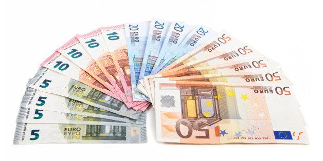 different euro bank notes fanned side by side, white background
