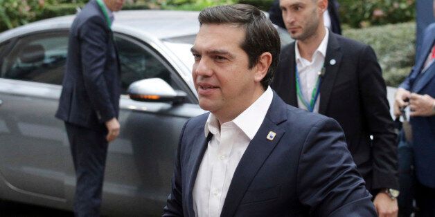 Greek Prime Minister Alexis Tsipras arrives for the EU summit in Brussels, Thursday, Oct. 20, 2016. British Prime Minister Theresa May will hold her first talks with European Union leaders and tell them that the U.K.'s decision to leave the bloc is irreversible. (AP Photo/Olivier Matthys)