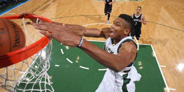 MILWAUKEE, WI - OCTOBER 29: Giannis Antetokounmpo #34 of the Milwaukee Bucks dunks the ball against the Brooklyn Nets on October 29, 2016 at BMO Harris Bradley Center in Milwaukee, Wisconsin. NOTE TO USER: User expressly acknowledges and agrees that, by downloading and or using this photograph, user is consenting to the terms and conditions of the Getty Images License Agreement. Mandatory Copyright Notice: Copyright 2016 NBAE (Photo by Gary Dineen/NBAE via Getty Images)