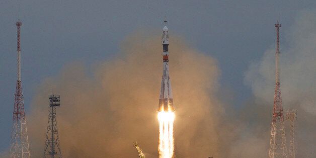 The Soyuz rocket booster with Soyuz MS-2 space ship carrying a new crew to the International Space Station blasts off in Russian leased Baikonur cosmodrome, Kazakhstan, Wednesday, Oct. 19, 2016. The Russian rocket carries US astronaut Shane Kimbrough and two Russian cosmonauts Sergey Ryzhikov and Andrey Borisenko. (AP Photo/Ivan Sekretarev)
