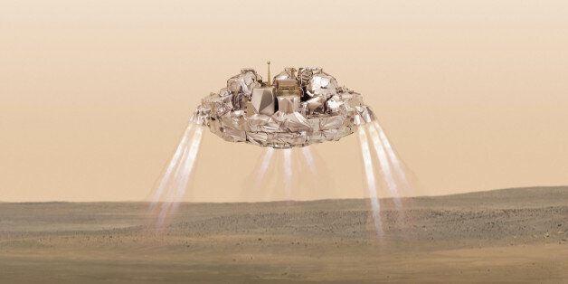 FILE - This artist impression provided by the European Space Agency shows the Schiaparelli module firing its landing thrusters as it approaches the surface of Mars. On Friday, Oct. 21, 2016, the ESA said their experimental Mars probe hit the right spot â but at the wrong speed â and may have ended up in a fiery ball of rocket fuel when it struck the surface. (M.Thiebaut/ATG-medialab/ESA via AP)