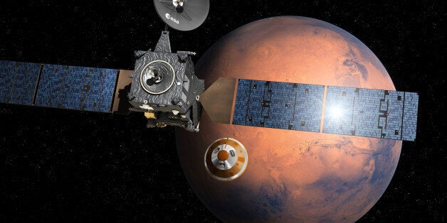 Artistâs impression provided by the European Space Agency, ESA, depicting the separation of the ExoMars 2016 entry, descent and landing demonstrator module, named Schiaparelli, center, from the Trace Gas Orbiter, TGO,lrft, and heading for Mars. The separation is scheduled to occur on Sunday Oct. 16, 2016, about seven months after launch. Schiaparelli is set to enter the martian atmosphere on Oct. 19, 2016 while TGO will enter orbit around Mars. The probe will take images of Mars and conduct scientific measurements on the surface, but its main purpose is to test technology for a future European Mars rover. Schiaparelli's mother ship will remain in orbit to analyze gases in the Martian atmosphere to help answer whether there is or was life on Mars. (ESA/D. Ducros via AP)