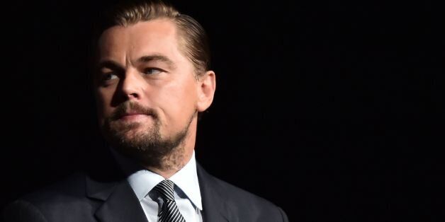 US actor Leonardo DiCaprio looks on prior to speaking on stage during the Paris premiere of the documentary film 'Before the Flood' on October 17, 2016 at the Theatre du Chatelet in Paris. US actor Leonardo DiCaprio has issued an impassioned call for immediate action on climate change in 'Before the Flood', a documentary film making its premiere in Paris on October 17. DiCaprio takes viewers around the world to meet experts and politicians in order to reveal the scale of the problem, its effects and the paths towards solutions. / AFP / POOL / CHRISTOPHE ARCHAMBAULT (Photo credit should read CHRISTOPHE ARCHAMBAULT/AFP/Getty Images)