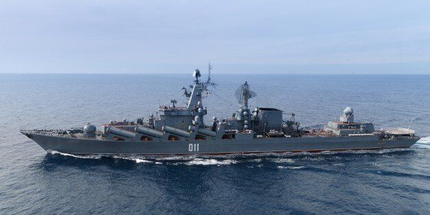 In this photo taken on Thursday, Jan. 21, 2016, the Russian missile cruiser Varyag on patrol in eastern Mediterranean. Russian warships equipped with an array of long-range missiles cruise off Syria's coast to back the air campaign in Syria and project Moscow's naval power in the Mediterranean. (Vadim Savitsky/Russian Defense Ministry Press Service via AP)