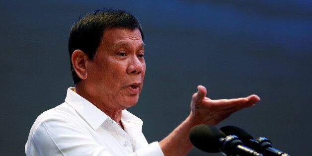 President Rodrigo Duterte speaks during a gathering of businessmen in Pasay city, Metro Manila, Philippines, October 13, 2016. REUTERS/Erik De Castro
