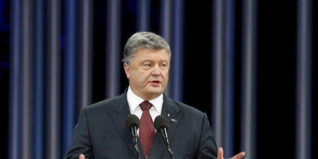 KIEV, UKRAINE - SEPTEMBER 29: Ukrainian President Petro Poroshenko delivers a speech during the 75th memorial ceremony tribute to victims of the 1941 Nazi mass executions of Jews,near the Minora monument at the Babi Yar,in Kiev,Ukraine, on September 29,2016. (Photo by Vladimir Shtanko/Anadolu Agency/Getty Images)
