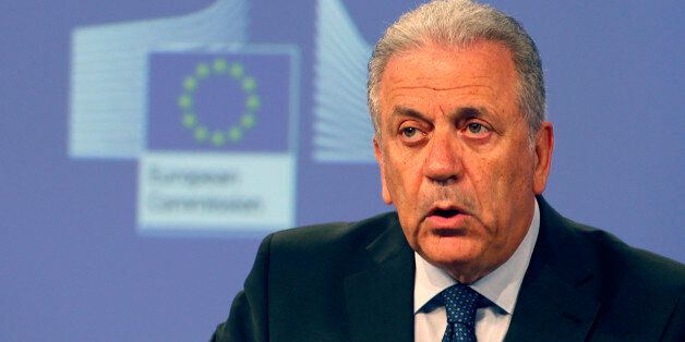 EU Commissioner for Migration, Home Affairs and Citizenship Dimitris Avramopoulos address the media at EU Commission headquarters in Brussels, Belgium, Wednesday, July 13, 2016. The European Union's executive arm is proposing new EU-wide rules for granting asylum and resettlement for migrants, among the most controversial of political issues in many European countries. The proposals were made public Wednesday by EU officials. (AP Photo/Darko Vojinovic)
