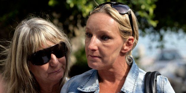 KOS, GREECE - OCTOBER 22: Kerry Grist (C) and her mother Christine Needham make a statement to the media as British police continue the search for Mrs Grist's son Ben Needham, who went missing 21 years ago, on October 22, 2012 in Kos, Greece. The toddler from Sheffield was 21 months old when he vanished on the Greek island in July, 1991. Specialist British search teams and Greek police started excavating the site last week. (Photo by Milos Bicanski/Getty Images)