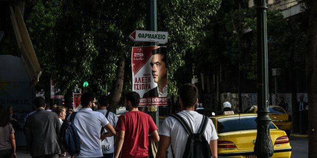 Poster of Alexis Tsipras in Athens, Greece on October 12, 2016. In an attempt to regain the immense loss in popularity SYRIZA filled the streets of Athens with posters advertizing the speech of PM Alexis Tsipras at the Party Congress. (Photo by Wassilios Aswestopoulos/NurPhoto via Getty Images)