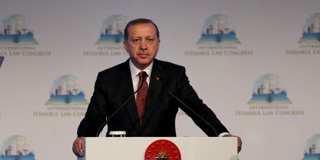 ISTANBUL, TURKEY - OCTOBER 17: President of Turkey Recep Tayyip Erdogan delivers a speech during the opening of the International Istanbul Law Congress in Istanbul, Turkey on October 17, 2016. (Photo by Berk Ozkan/Anadolu Agency/Getty Images)