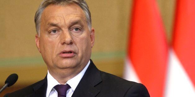 Hungarian Prime Minister Viktor Orban speaks during a press conference concerning the referendum held in Hungary last Sunday on the European Commission's proposed mandatory resettlement of migrants in member states of EU following an extraordinary session of the faction of the Fidesz party in the Parliament in Budapest, Hungary, Tuesday, Oct. 4, 2016. (Zsolt Szigetvary/MTI via AP)