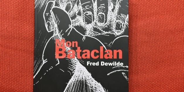 This picture taken in Paris on October 20, 2016, shows the comic book 'Mon Bataclan'.Fred Dewilde, a 50 years old graphic designer, describes in the comic strip 'Mon Bataclan' his appalling experience at the Bataclan concert hall during the night of the Paris attacks. / AFP / BERTRAND GUAY (Photo credit should read BERTRAND GUAY/AFP/Getty Images)