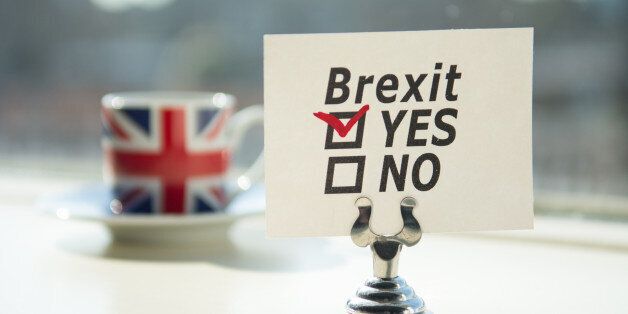 coffee with union jack and an brexit referendum note with yes checked