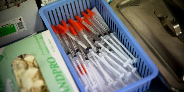 Syringes sit in a a basket in the operating room at the Pratunam Polyclinic in Bangkok, Thailand, on Friday, Oct. 2, 2015. For about 70,000 baht ($1,950), patients male genitalia can be reassigned female in a procedure Thep says he does once a week in his Pratunam Polyclinic, a solo practice in Bangkoks low-rent garment district. Photographer: Brent Lewin/Bloomberg via Getty Images