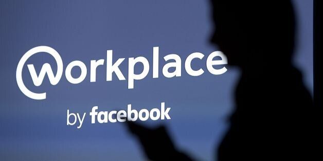 A logo for Facebook's 'Workplace' is seen in this posed photograph following the social media company's launch event for the product 'Workplace', in central London on October 10, 2016.Social network giant Facebook launched new global product Workplace, a platform that it hopes will replace intranet, mailbox and other internal communication tools used by businesses worldwide. It is intended to compete with similar office communication products including Microsoft's Yammer, Salesforce's Chatter an