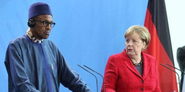 BERLIN, GERMANY - OCTOBER 14: German Chancellor Angela Merkel and Nigerian President Muhammadu Buhari (L) hold a joint press conference after their meeting in Berlin, Germany on October 14, 2016. (Photo by Erbil Basay/Anadolu Agency/Getty Images)