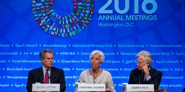 IMF Managing Director Christine Lagarde speaks during a press conference at the 2016 Annual Meetings of the International Monetary Fund Headquarters and the World Bank Group at the IMF October 6, 2016 in Washington, DC. Also pictured are IMF First Deputy Managing Director David Lipton(L) and IMF Spokesman Gerry Rice. / AFP / ZACH GIBSON (Photo credit should read ZACH GIBSON/AFP/Getty Images)