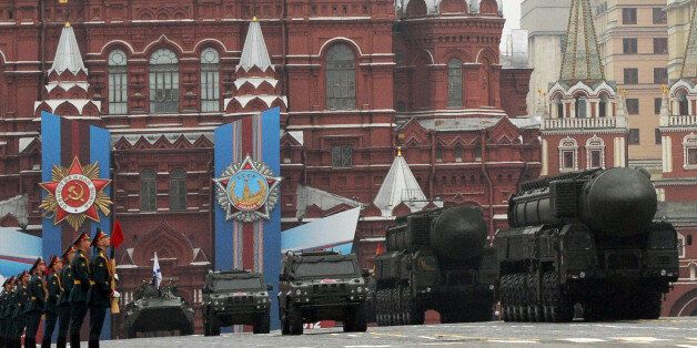 A column of Russia's Topol intercontinental ballistic missile launchers rolls at the Red Square in Moscow, on May 9, 2012, during Victory Day parade. Thousands of Russian soldiers marched today alongside nuclear-capable missiles to commemorate the 67th anniversary of the Soviet victory over Nazi Germany. AFP PHOTO / KIRILL KUDRYAVTSEV (Photo credit should read KIRILL KUDRYAVTSEV/AFP/GettyImages)