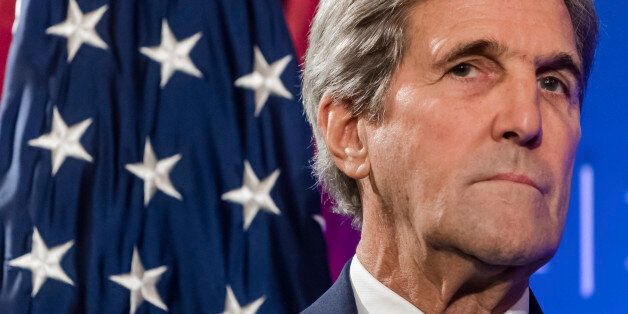 In this Oct. 4, 2016 photo, U.S. Secretary of State John Kerry pauses, during a speech at an event hosted by The German Marshall Fund (GMF) and the U.S. Mission to the EU at Concert Noble in Brussels. Kerry called Friday for Russia and Syria to face a war crimes investigation for their attacks on Syrian civilians, further illustrating the downward spiral in relations between Washington and Moscow. (AP Photo/Geert Vanden Wijngaert)