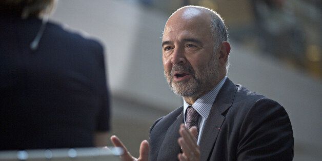 Pierre Moscovici, economic commissioner for the European Union (EU), speaks during a Bloomberg Television interview at the International Monetary Fund (IMF) and World Bank Group Annual Meetings in Washington, D.C., U.S., on Thursday, Oct. 6, 2016. The IMF warned this week that rising political tensions over globalization are threatening to derail a world recovery already seeking a reliable growth engine. Photographer: Andrew Harrer/Bloomberg via Getty Images