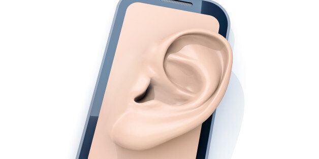 Smartphone with ear as a symbol for surveillance.