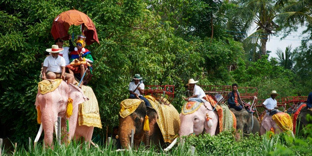 Every year at Ban Ta Klang, Thailandâs largest elephant village, the ethnic Kui people held the Buddhist ceremony to ordain young male villagers. The group of pre-ordination ride on elephantâs back and parade around the village. The ordination procession on elephantâs backs reflects bonds of Kui people with the elephants and traditional belief.