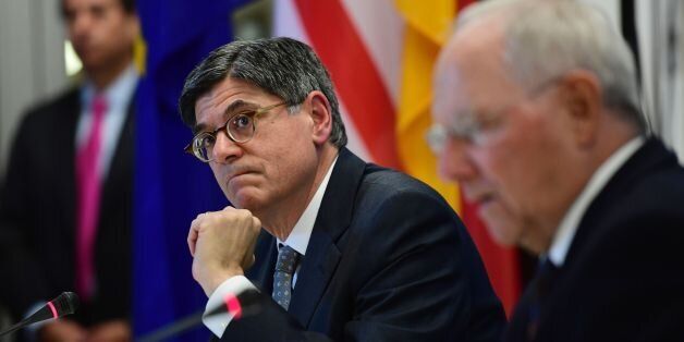 German Finance Minister Wolfgang Schaeuble (R) and US Treasury Secretary Jacob Lew give a joint press conference on July 14, 2016 in Berlin.Lew said he would travel to Britain for the second time in a week to met new finance minister Philip Hammond. Britain's new Prime Minister Theresa May on Wednesday (July 13, 2016) appointed Hammond to replace George Osborne as chancellor of the exchequer. / AFP / John MACDOUGALL (Photo credit should read JOHN MACDOUGALL/AFP/Getty Images)