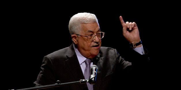 Palestinian President Mahmoud Abbas, gestures as he speaks during a conference in the West Bank City of Bethlehem, Saturday, Oct. 1, 2016. With peace efforts in a deep freeze, Palestinian President Mahmoud Abbas made his first trip to Jerusalem in six years to attend Peres' funeral Friday, shaking hands and making small talk with his longtime adversary, Israeli Prime Minister Benjamin Netanyahu, and challenging the government's narrative that he is not a reliable partner for peace. (AP Photo/Maj
