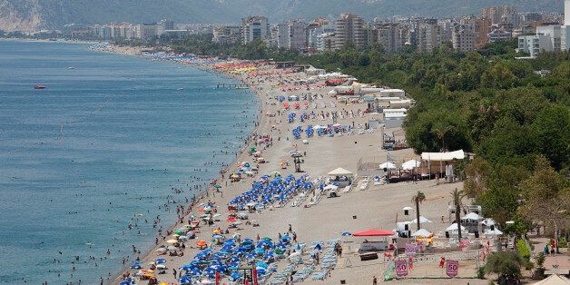 Turkey, Antalya, Konyaalti Beach lined with building and trees