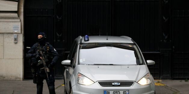 French police and members of the National Gendarmerie Intervention Group (GIGN) surveys the entrance of the Paris courthouse after a convoy transporting a surviving member of the group that carried out Paris terror attacks suspect Salah Abdeslam for his first questioningby anti-terror judges arrive, in Paris on May 20, 2016 .Salah Abdeslam was part of the group that carried out Paris terror attacks on November 13, 2015 that killed 130 people. / AFP / MATTHIEU ALEXANDRE (Photo credit should read MATTHIEU ALEXANDRE/AFP/Getty Images)