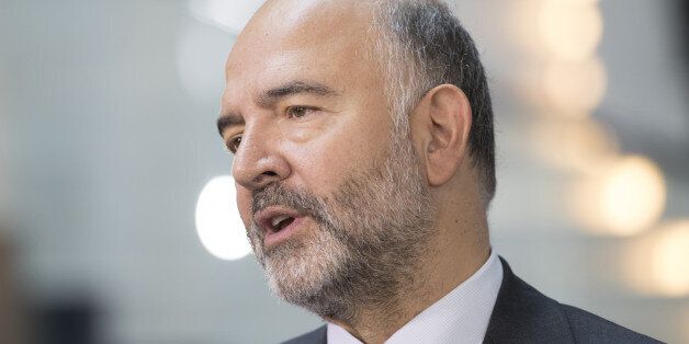 Pierre Moscovici, economic commissioner for the European Union (EU), speaks during a Bloomberg Television interview at the European Parliament in Strasbourg, France, Wednesday, Sept. 14, 2016. European Commission President Jean-Claude Juncker said that the coming year will be vital for the European Union as it seeks to remain relevant following the U.K. decision to quit the 28-nation bloc. Photographer: Jasper Juinen/Bloomberg via Getty Images