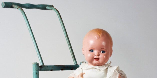 Blondkopfehen, celluloid doll on a stroller, made by Rheinische Gummi und Celluloid Fabrik. Germany, 20th century.