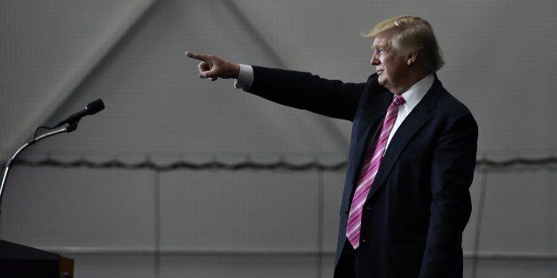 Republican presidential nominee Donald Trump gestures following a rally at Spooky Nook Sports center in Manheim, Pennsylvania on October 1, 2016. / AFP / Mandel Ngan (Photo credit should read MANDEL NGAN/AFP/Getty Images)