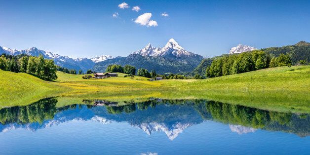 Idyllic summer landscape with clear mountain lake in the Alps.