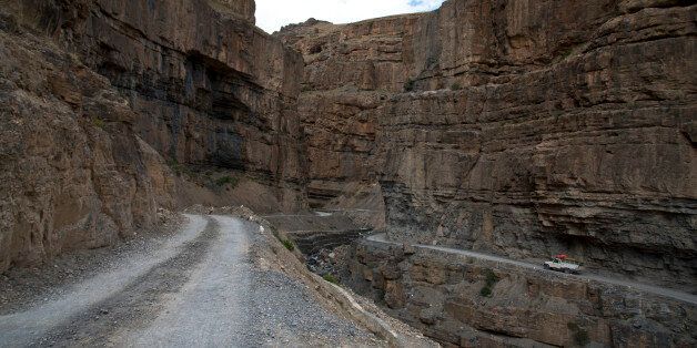 In this Aug. 15, 2016, photo, a car drives along a mountain road that leads to Spiti Valley, a remote Himalayan valley situated at 4000 meter above sea level, India. It takes about ten hours to reach from Manali, a city in Himachal Pradesh. For centuries, the sleepy valley nestled in the Indian Himalayas remained a hidden Buddhist enclave forbidden to outsiders. That's all now starting to change, for better or worse, since India began allowing its own citizens as well as outsiders to visit the valley in the early 1990s. (AP Photo/Thomas Cytrynowicz)