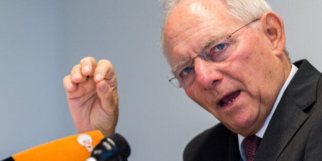 German Finance Minister Wolfgang Schauble addresses the media after a meeting of EU economy and finance ministers at the EU Council building in Luxembourg on Tuesday, Oct. 6, 2015. (AP Photo/Geert Vanden Wijngaert)