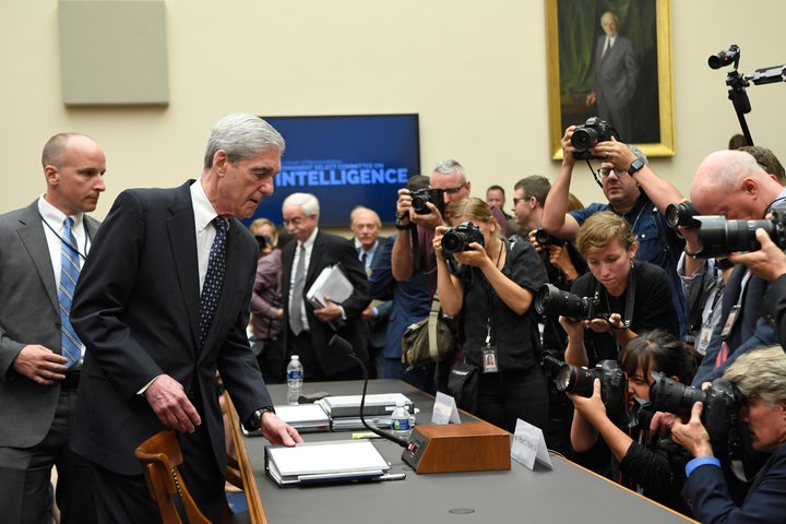 Former special counsel Robert Mueller returns to the witness table following a break in his July 24 testimony before the House Intelligence Committee.