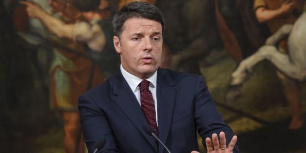 Italian Prime Minister Matteo Renzi gestures during a press conference for reconstruction efforts for areas and victims affected by the August 24 earthquake on September 23, 2016 at the Palazzo Chigi in Rome. / AFP / ANDREAS SOLARO (Photo credit should read ANDREAS SOLARO/AFP/Getty Images)